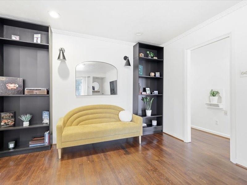 2330 Peavy Place Dallas, TX 75228 - Photo 11 of 39 a bedroom with a bed and wooden floor