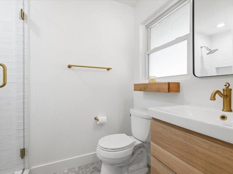 2330 Peavy Place Dallas, TX 75228 - Photo 18 of 39 a bathroom with a sink and a mirror