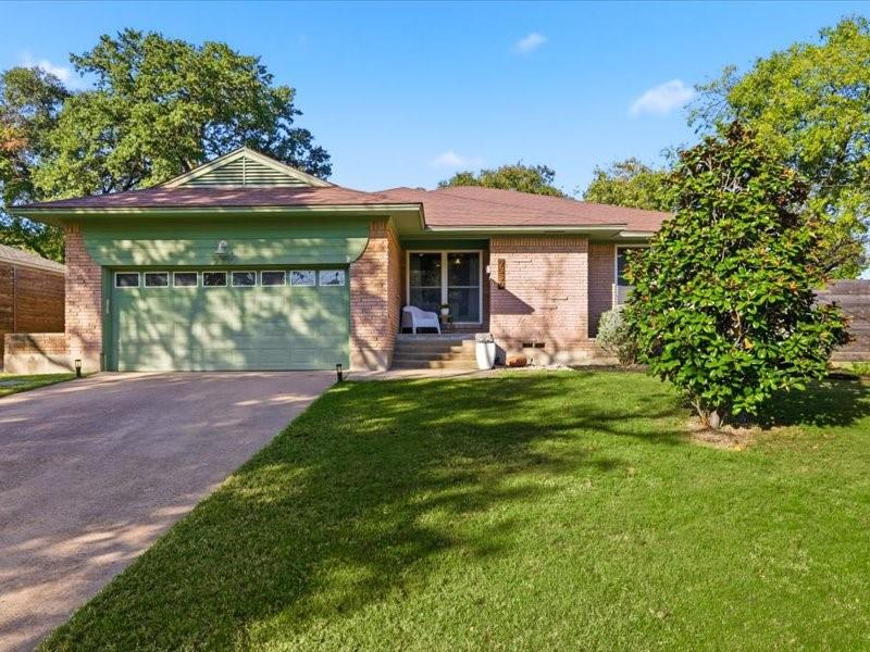 2330 Peavy Place Dallas, TX 75228 - Photo 2 of 39 a front view of a house with garden