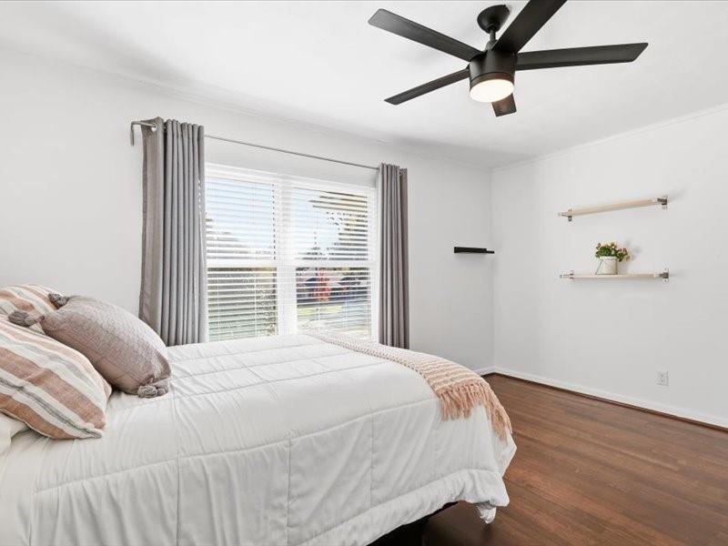 2330 Peavy Place Dallas, TX 75228 - Photo 23 of 39 a bedroom with a bed and a window