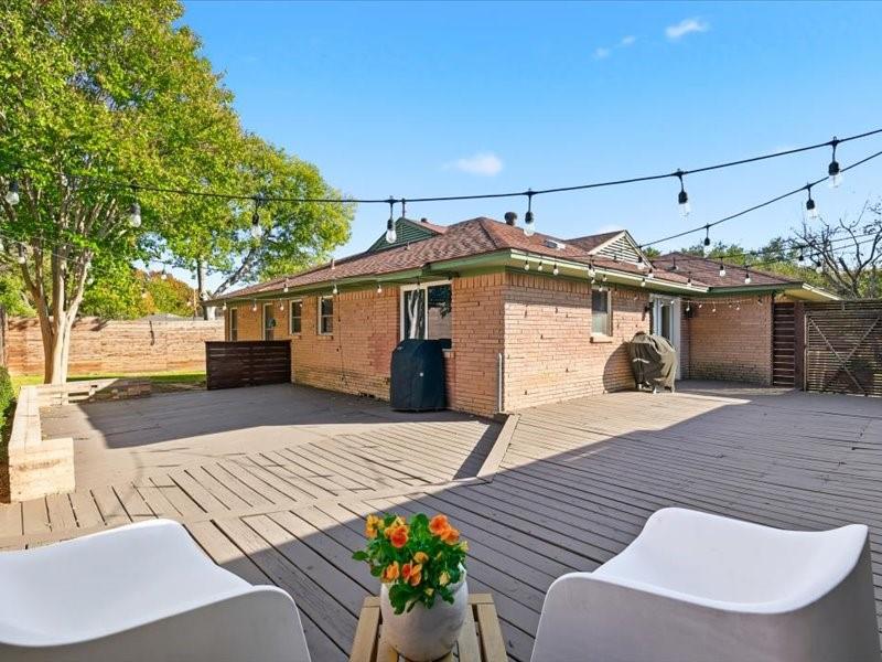 2330 Peavy Place Dallas, TX 75228 - Photo 26 of 39 a front view of a house with a yard
