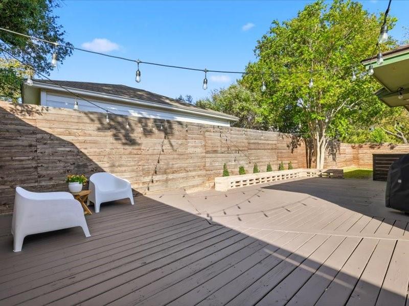 2330 Peavy Place Dallas, TX 75228 - Photo 27 of 39 a view of a terrace with wooden floor and fence