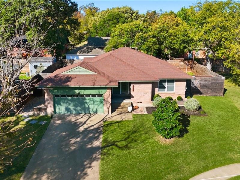 2330 Peavy Place Dallas, TX 75228 - Photo 33 of 39 a view of house with yard and outdoor seating