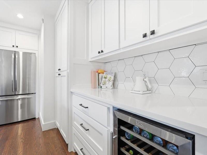 2330 Peavy Place Dallas, TX 75228 - Photo 7 of 39 a kitchen with stainless steel appliances a refrigerator and cabinets