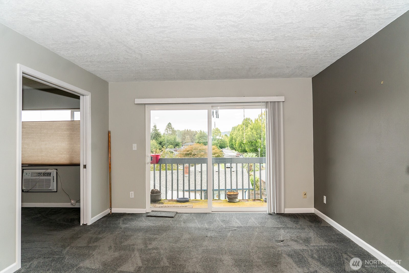 2005 Tibbetts Drive, Unit 305 Longview, WA 98632 - Photo 9 of 16 a view of an empty room with a window