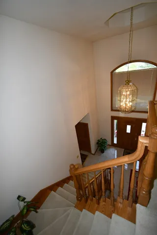 a living room with furniture and a lamp