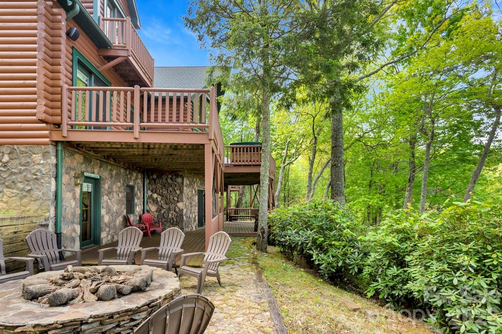 35 Falcon Crest Loop Maggie Valley, NC 28751 - Photo 37 of 46 a view of a patio with table and chairs and potted plants
