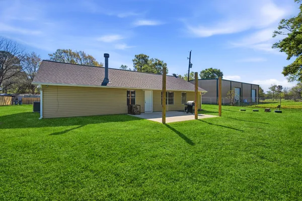 a view of a park with large trees