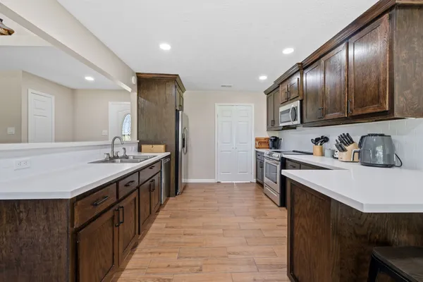 a kitchen with granite countertop lots of counter top space