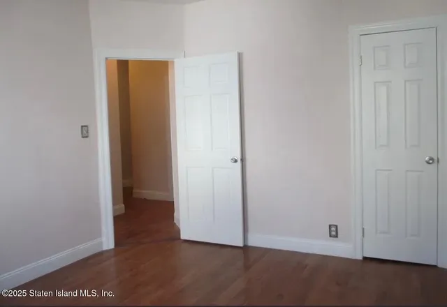 an empty room with closet
