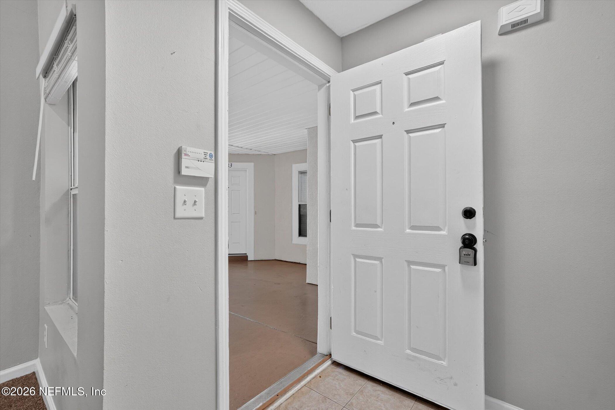 7920 Merrill Road, Unit 612 Jacksonville, FL 32277 - Photo 9 of 35 08-7920-Merrill-Rdunit-612-WindowStill-P