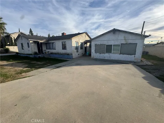 a view of a street in front of the house