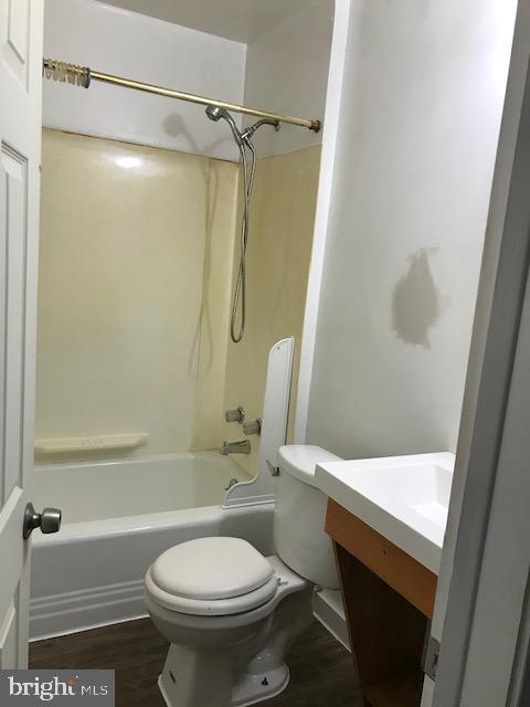 2 Yorkway Dundalk, MD 21222 - Photo 5 of 8 a bathroom with a sink a toilet and a bathtub