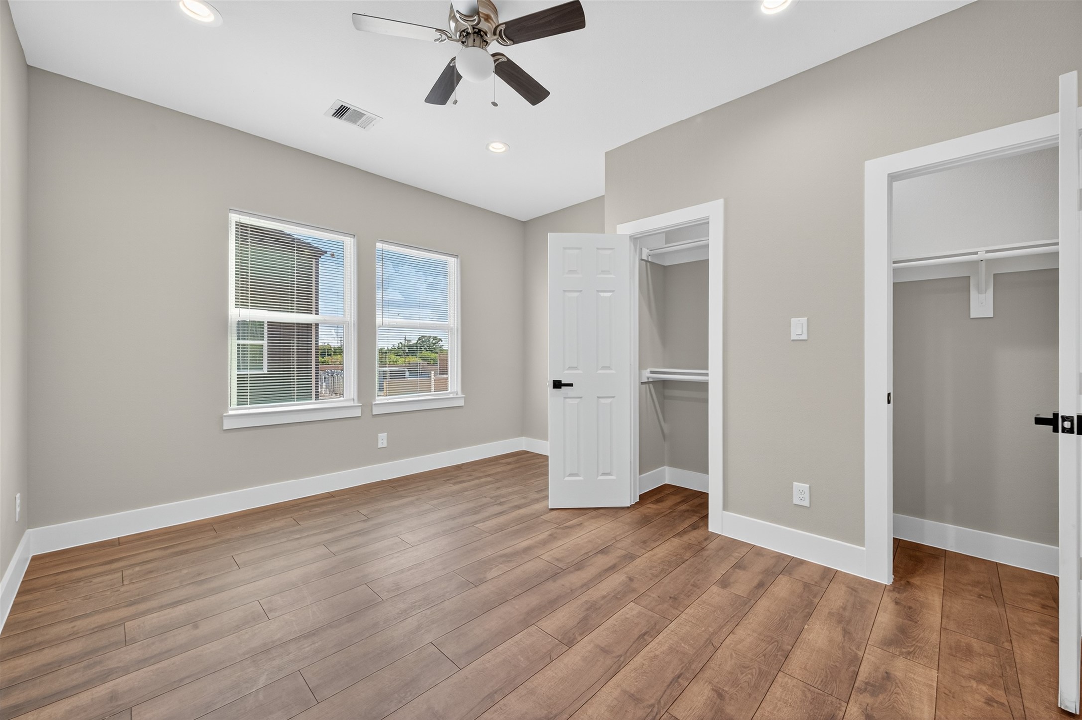 2109 Marnel Road, Unit G Houston, TX 77055 - Photo 12 of 27 wooden floor in an empty room with a window
