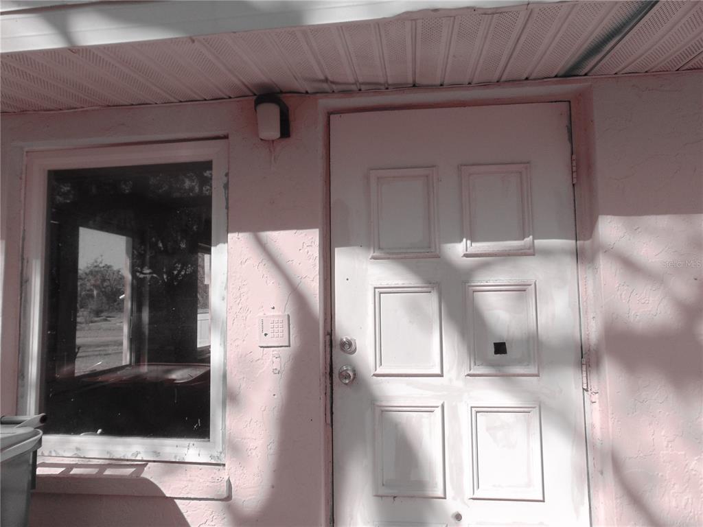 4385 Guard Street Punta Gorda, FL 33980 - Photo 8 of 14 a view of a hallway with entryway