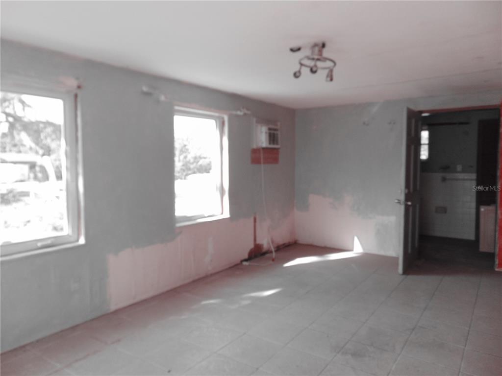 4385 Guard Street Punta Gorda, FL 33980 - Photo 9 of 14 a view of an empty room with a window