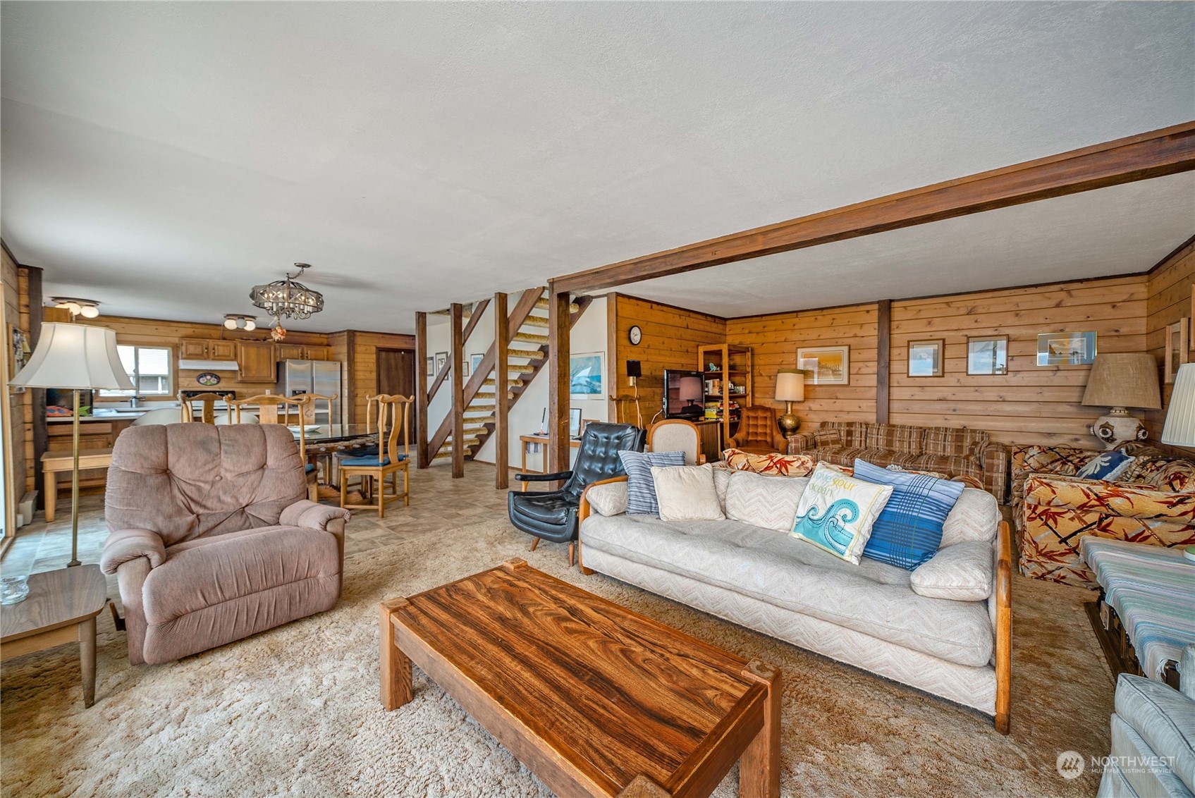 191 Northeast Wagon Wheel Road Belfair, WA 98528 - Photo 11 of 27 a living room with furniture and wooden floor