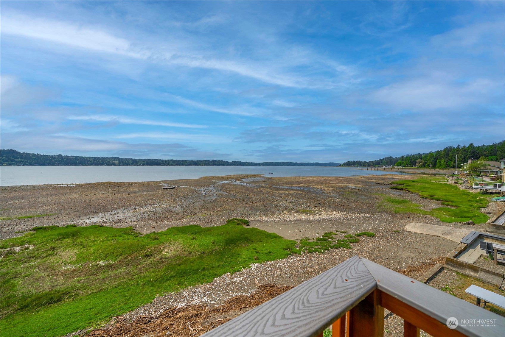 191 Northeast Wagon Wheel Road Belfair, WA 98528 - Photo 19 of 27 a view of an ocean from a balcony