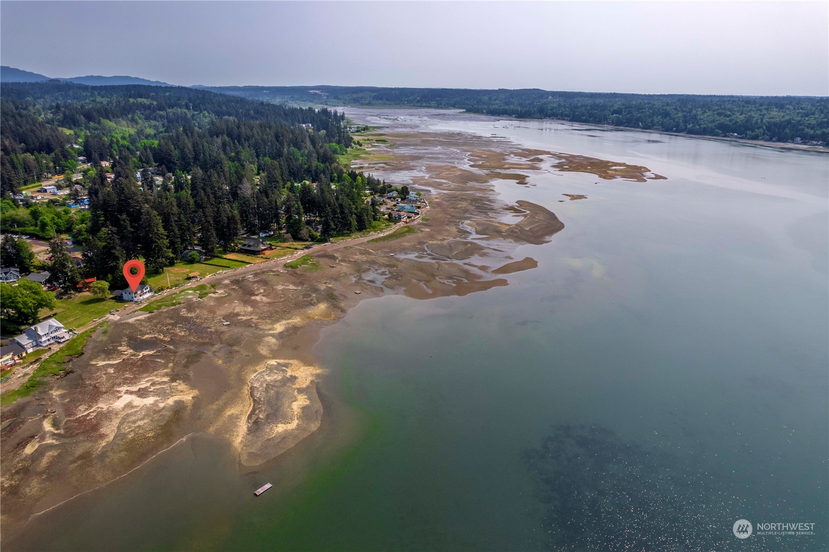 191 Northeast Wagon Wheel Road Belfair, WA 98528 - Photo 27 of 27 a view of a lake with a mountain