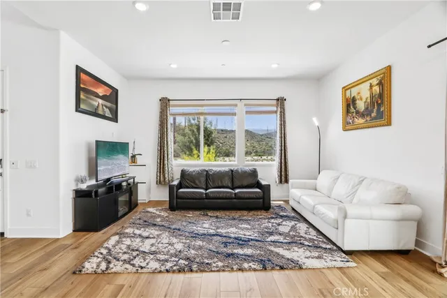 a living room with furniture and a couch