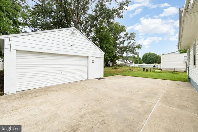 a view of a backyard of the house
