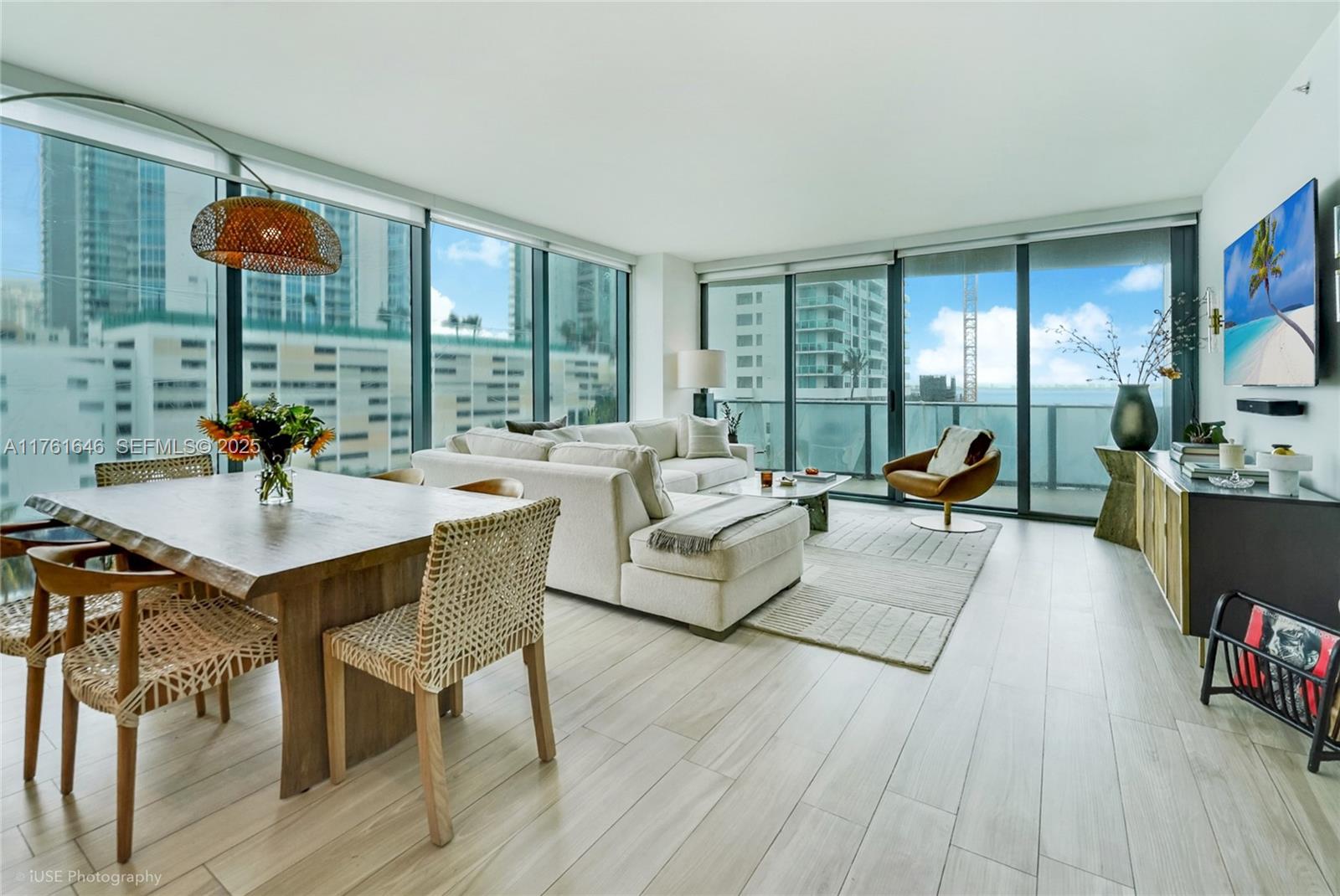 Edgewater Miami, FL 33137 - Photo 3 of 15 a living room with furniture and a large window
