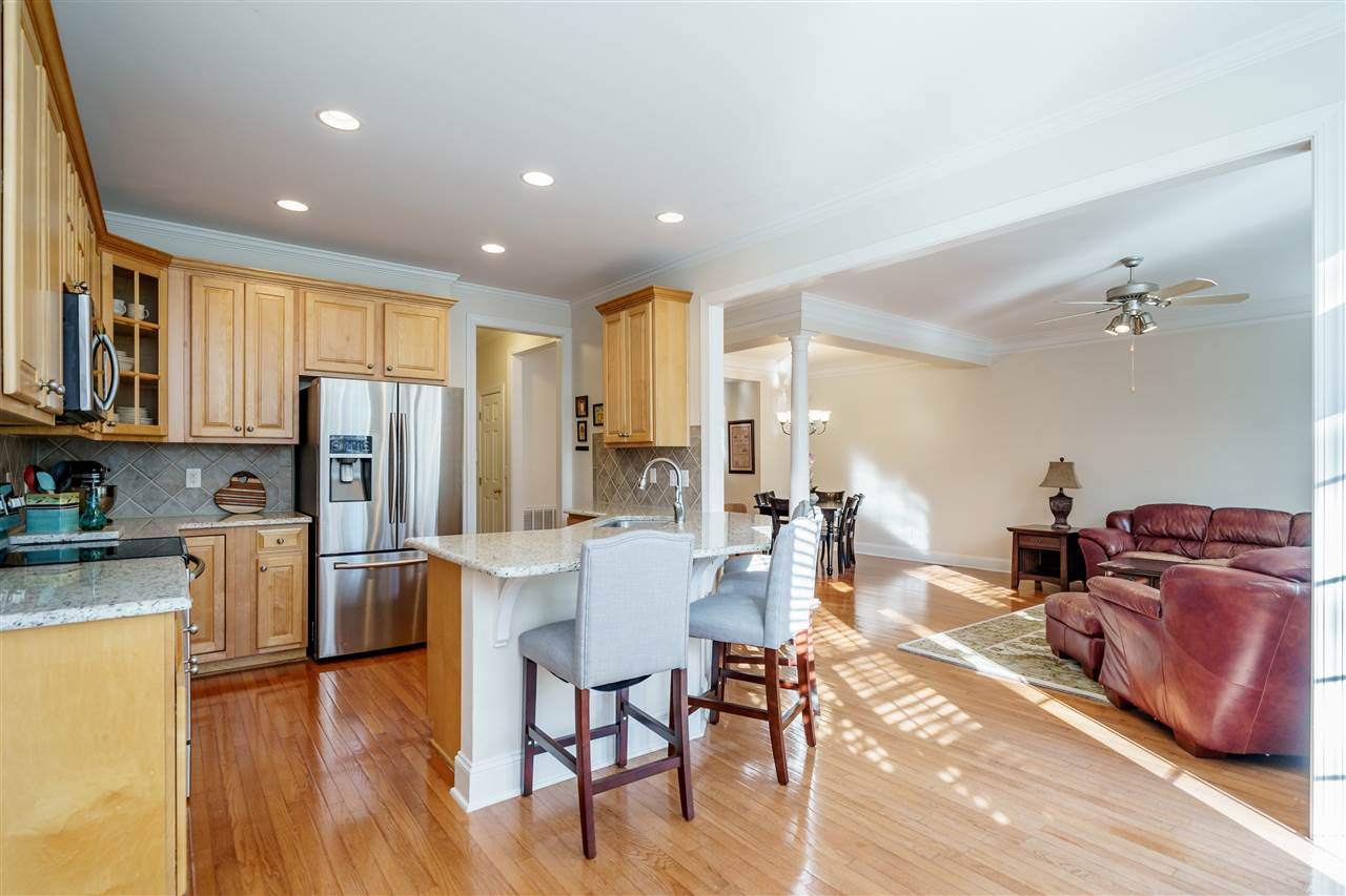 7224 Summit Waters Lane Raleigh, NC 27613 - Photo 11 of 30 Kitchen/Living Room/Dining Room