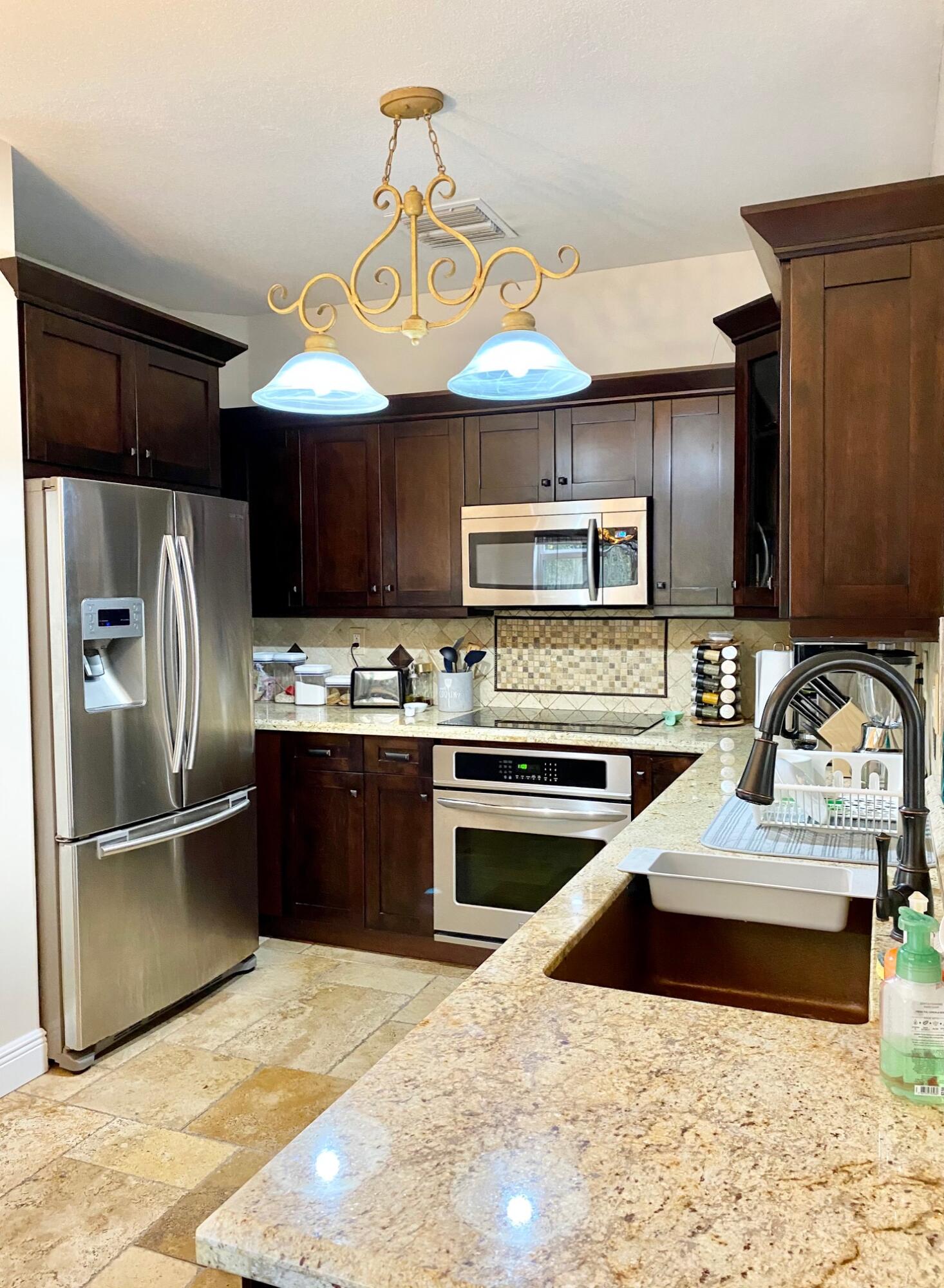 15852 Southwest 61st Street Miami, FL 33193 - Photo 4 of 16 c012ee59b185-IMG_4302