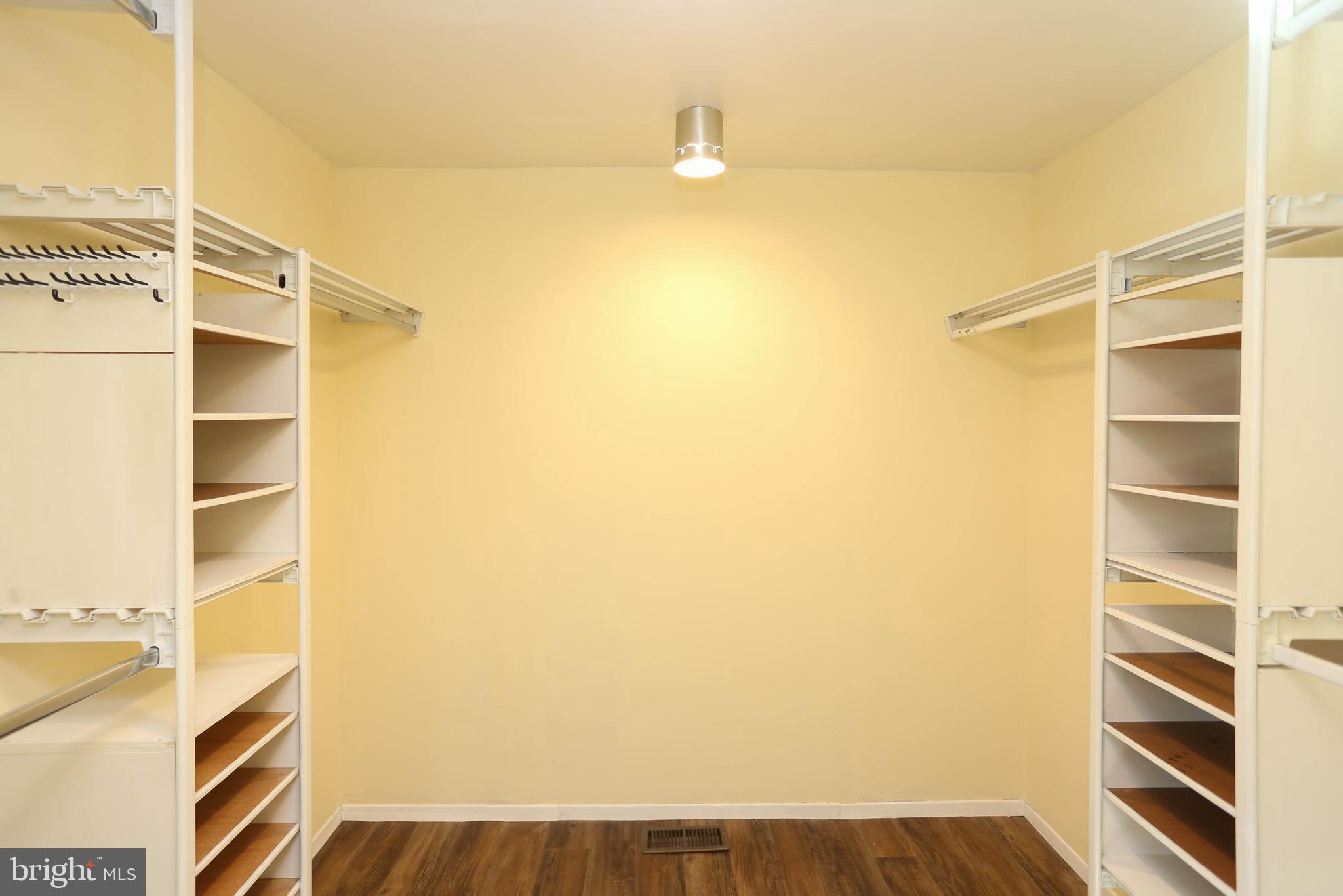 9110 Montpelier Drive Laurel, MD 20708 - Photo 14 of 30 a view of walk in closet with empty racks