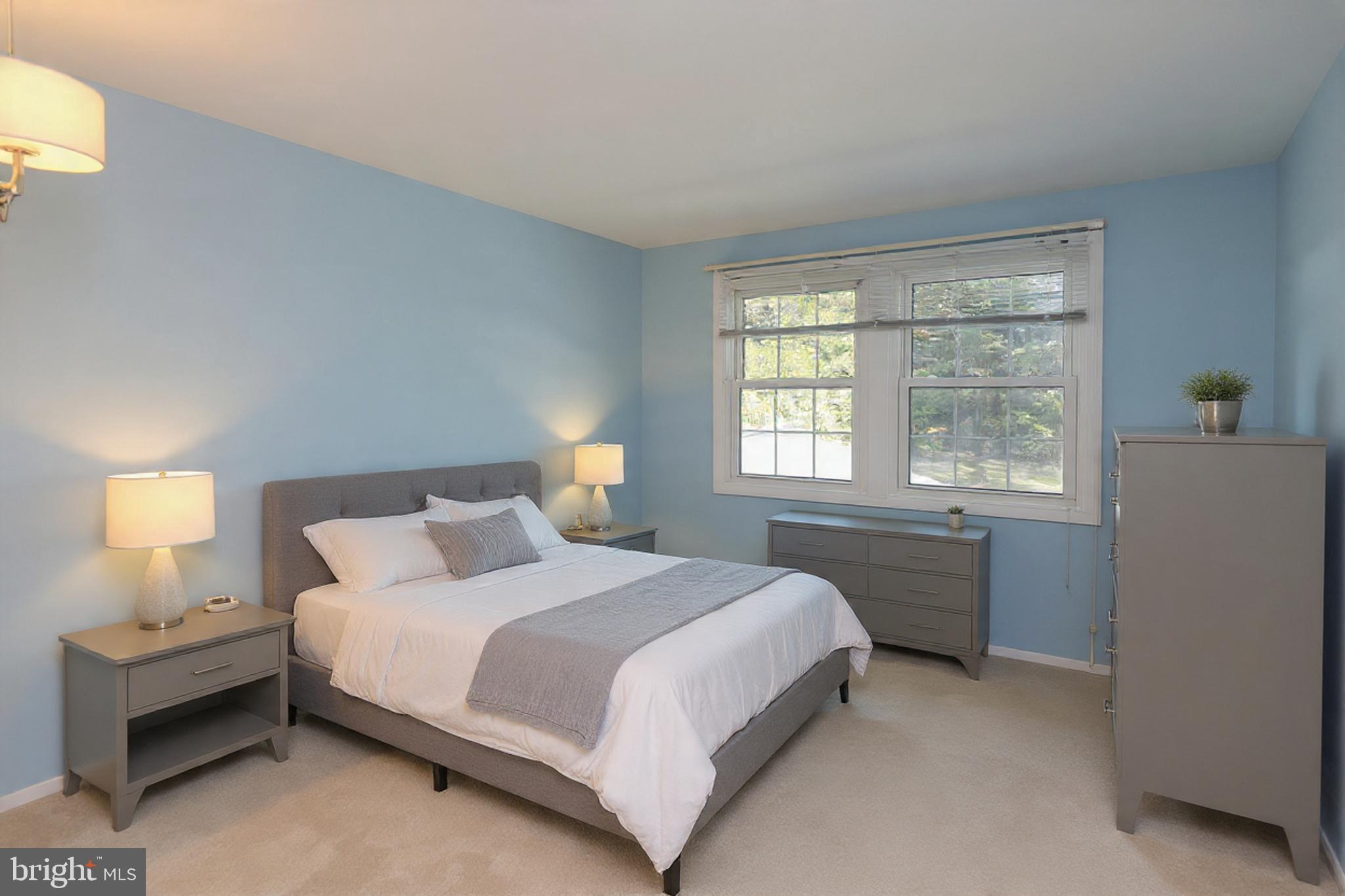 9110 Montpelier Drive Laurel, MD 20708 - Photo 19 of 30 a bedroom with a bed and a window