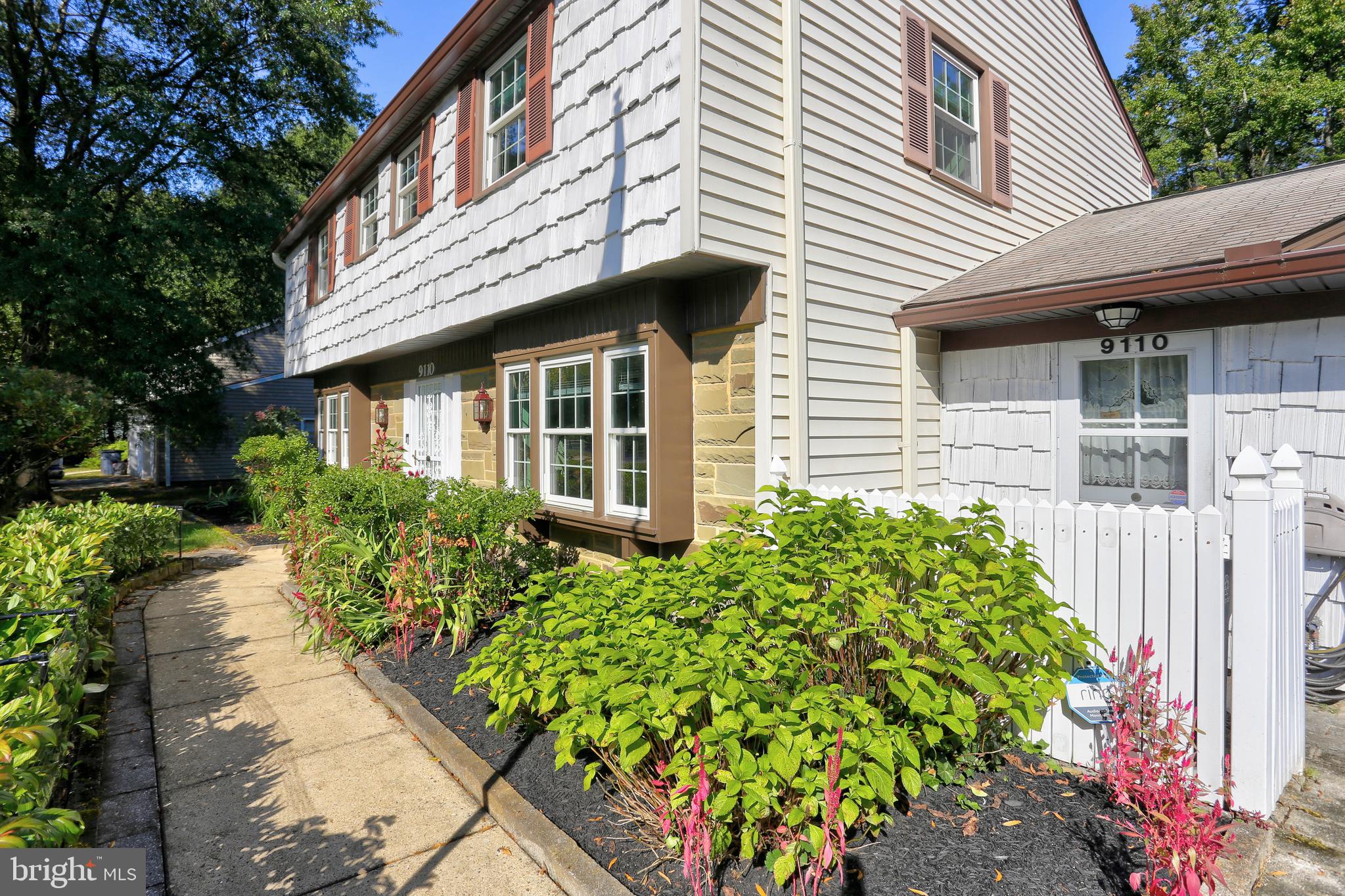 9110 Montpelier Drive Laurel, MD 20708 - Photo 2 of 30 a view of a house with a yard and garden