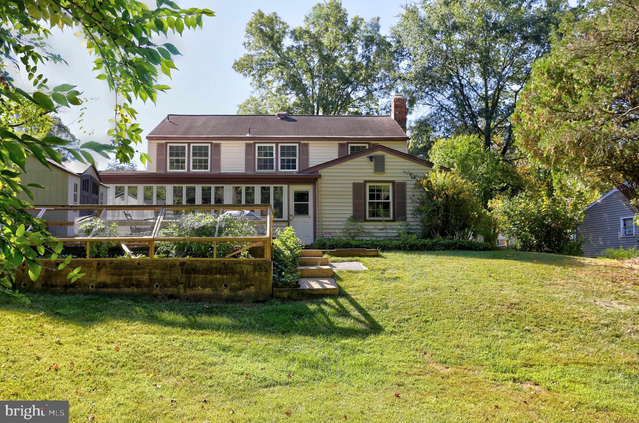 9110 Montpelier Drive Laurel, MD 20708 - Photo 29 of 30 a front view of a house with a yard
