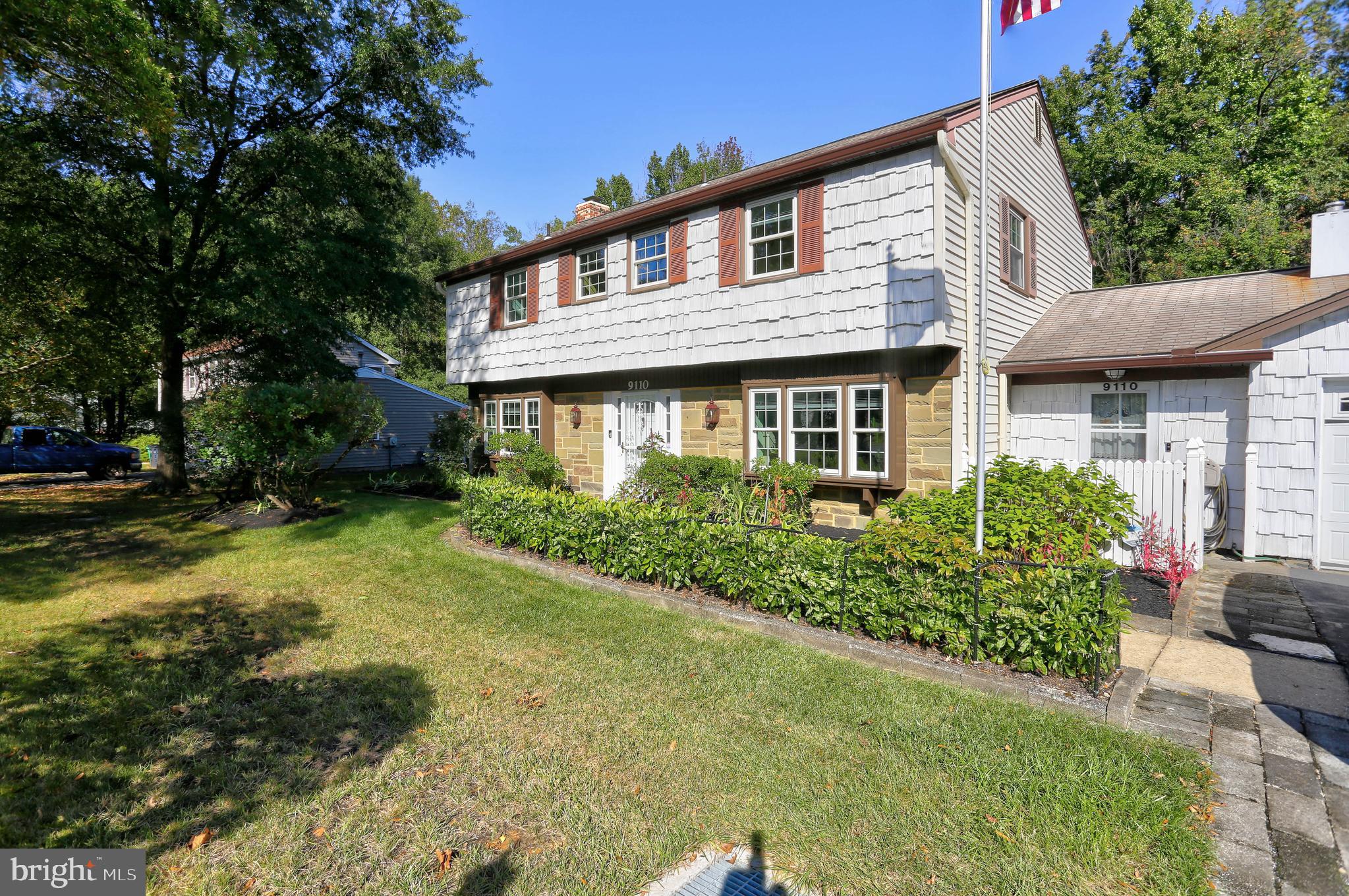 9110 Montpelier Drive Laurel, MD 20708 - Photo 3 of 30 a front view of a house with a yard