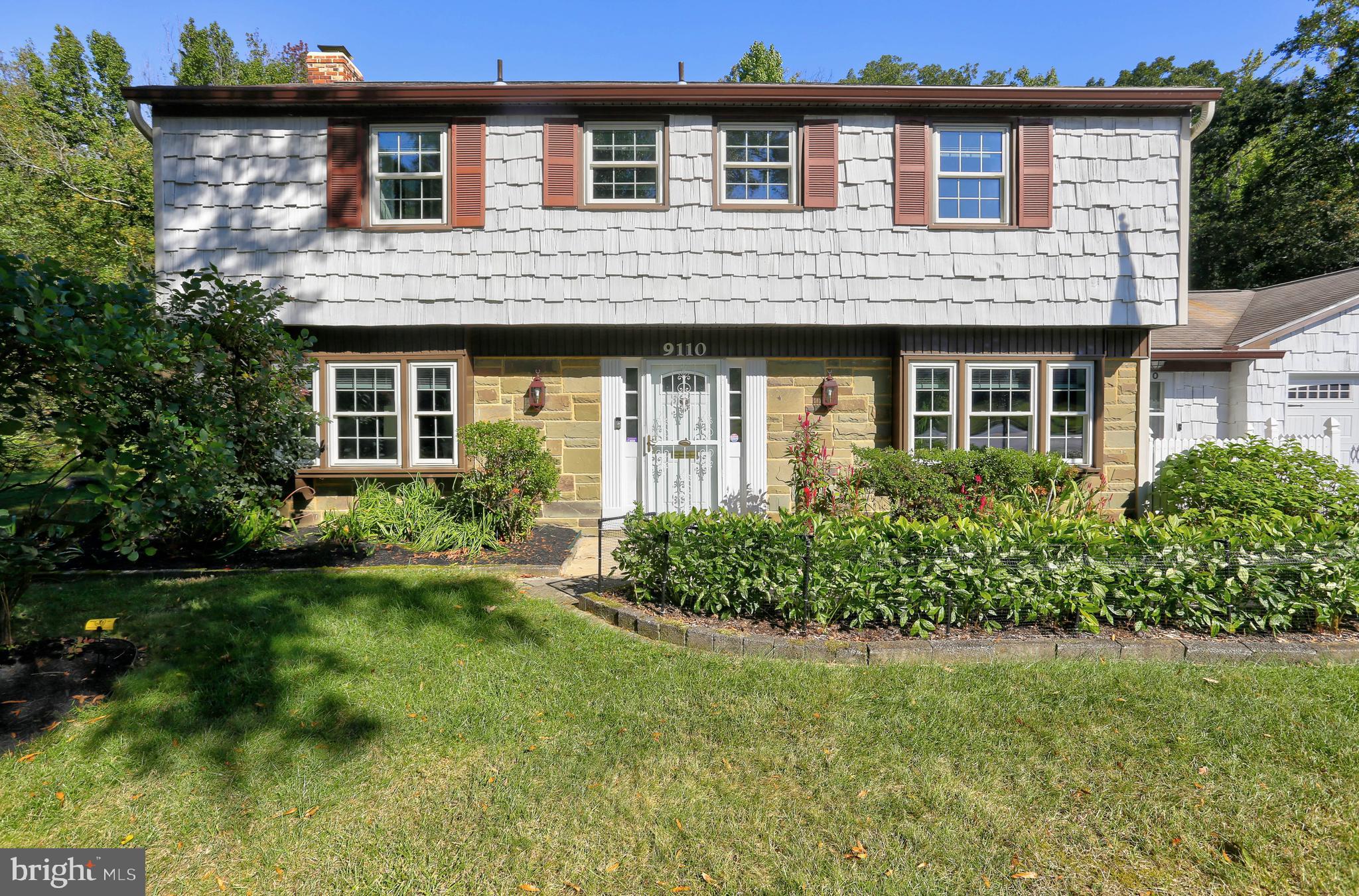 9110 Montpelier Drive Laurel, MD 20708 - Photo 4 of 30 a front view of a house with a garden