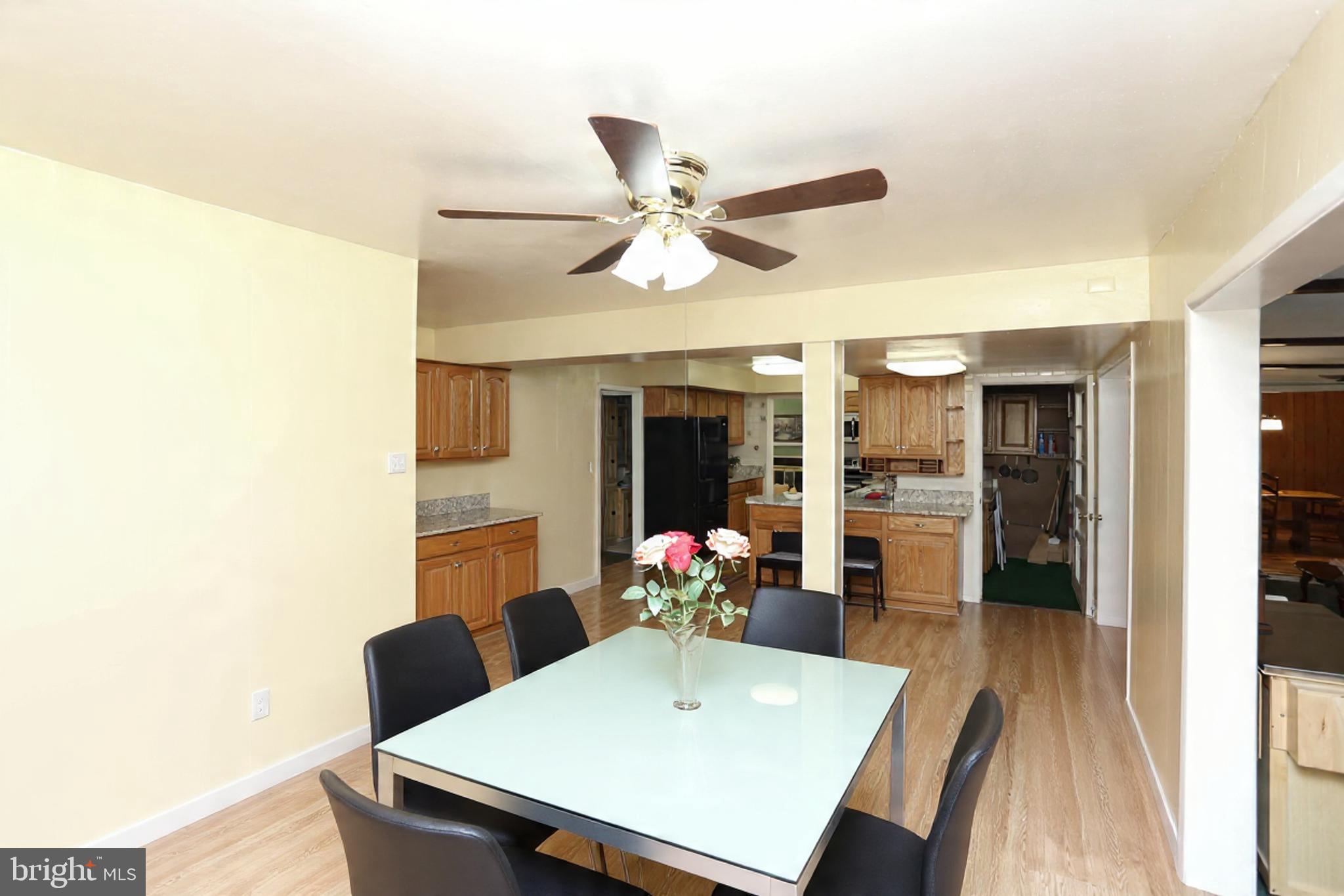 9110 Montpelier Drive Laurel, MD 20708 - Photo 7 of 30 a dining room with furniture and window