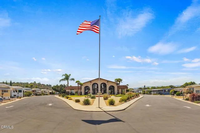 a view of a white house with a sink
