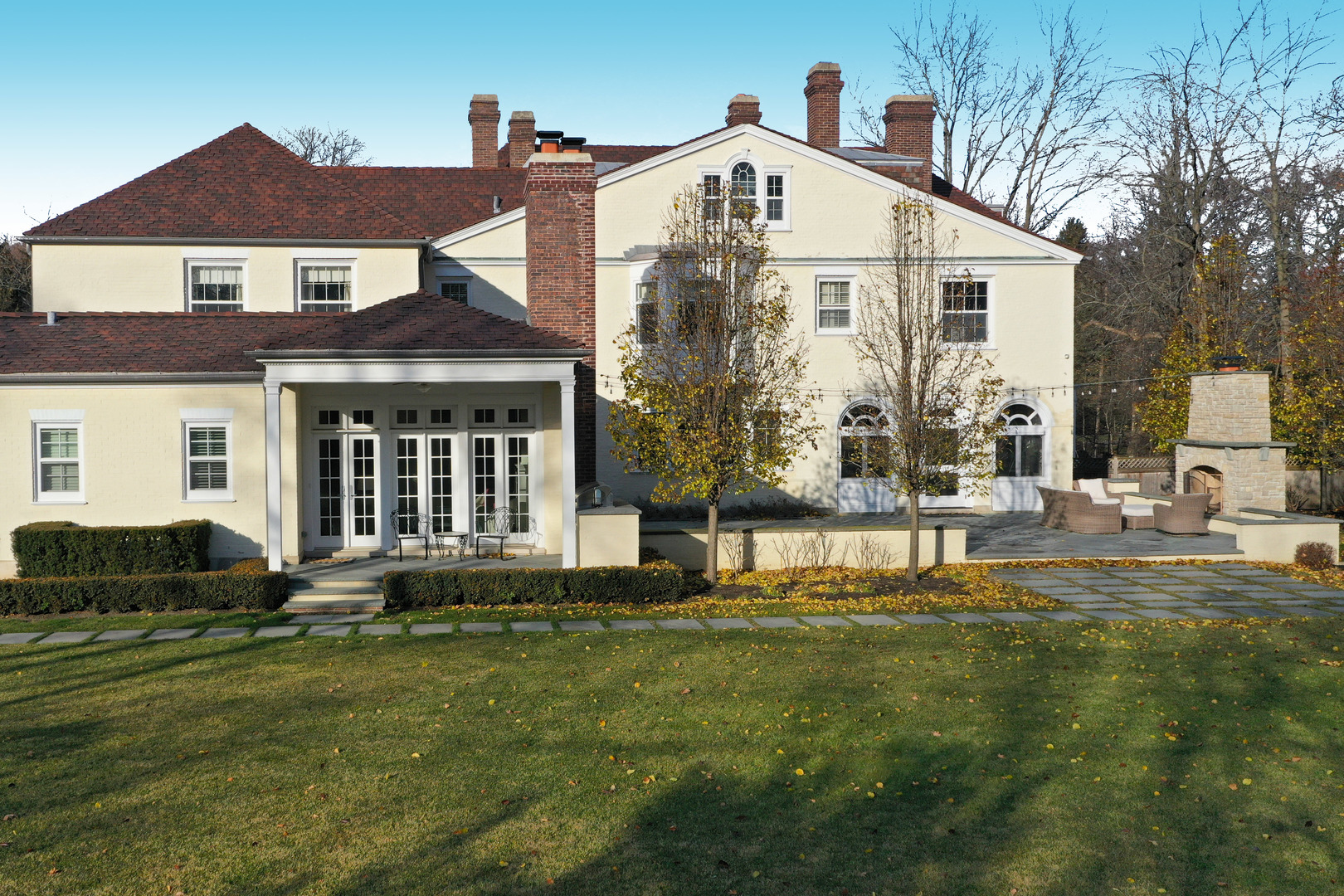 Undisclosed Address Lake Forest, IL 60045 - Photo 11 of 75 a front view of a house with a yard