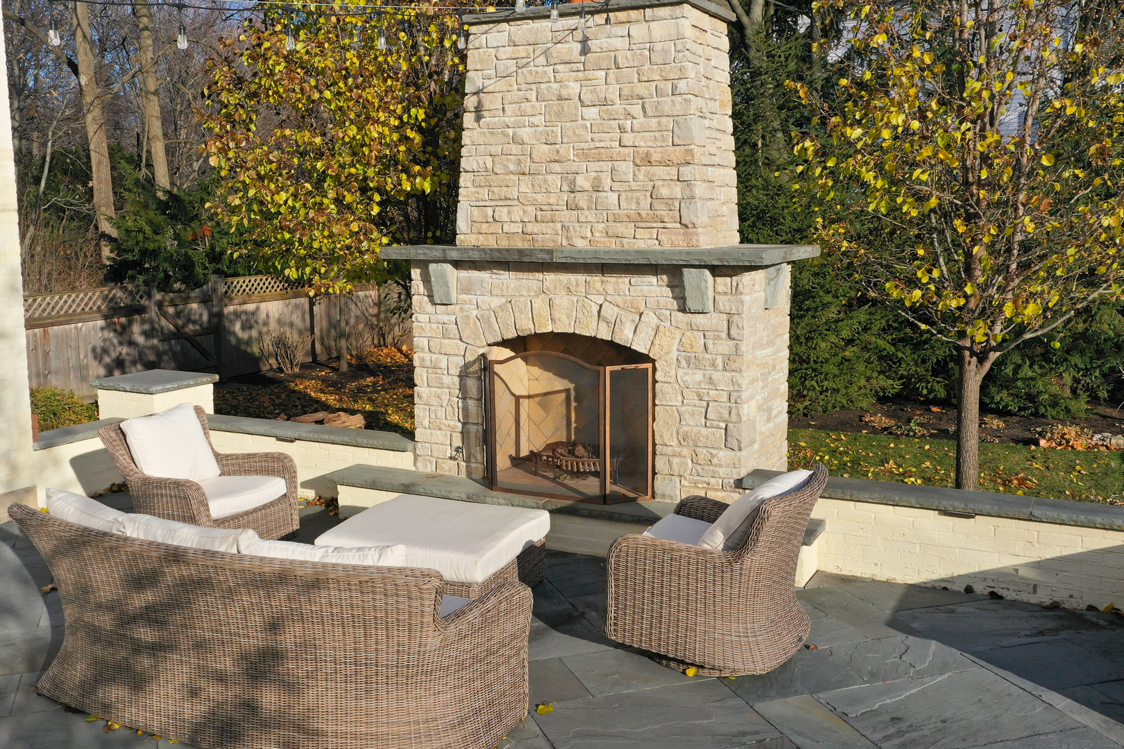Undisclosed Address Lake Forest, IL 60045 - Photo 13 of 75 a view of a couches and a fire pit in the patio