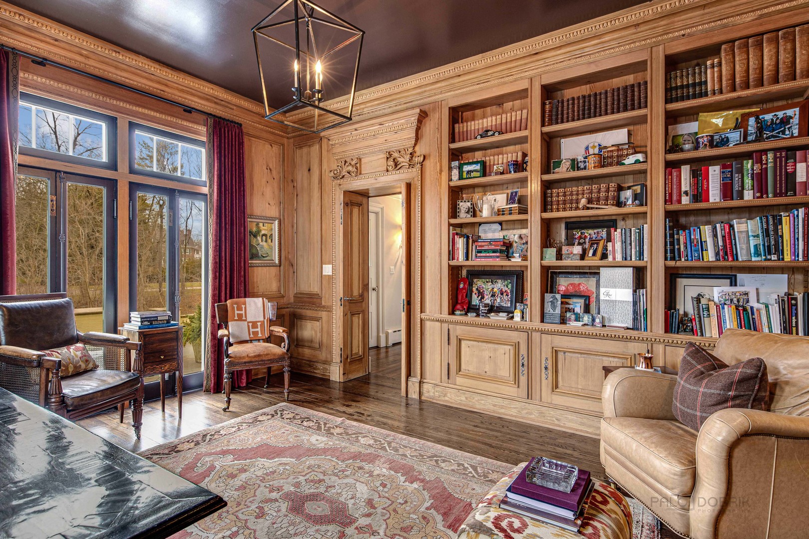 Undisclosed Address Lake Forest, IL 60045 - Photo 23 of 75 a living room with furniture a bookshelf and a book shelf