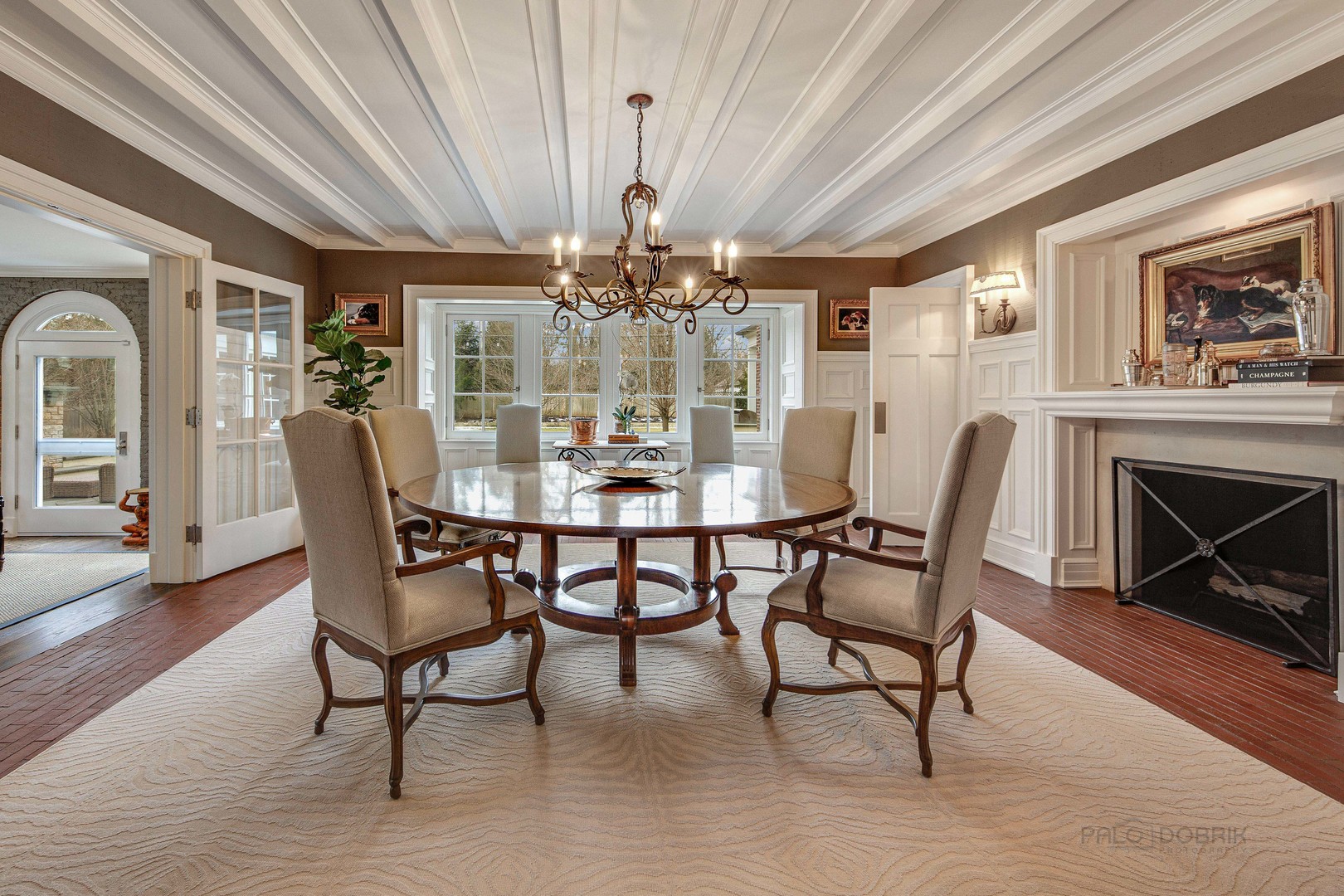 Undisclosed Address Lake Forest, IL 60045 - Photo 25 of 75 a dining room with furniture a chandelier and wooden floor