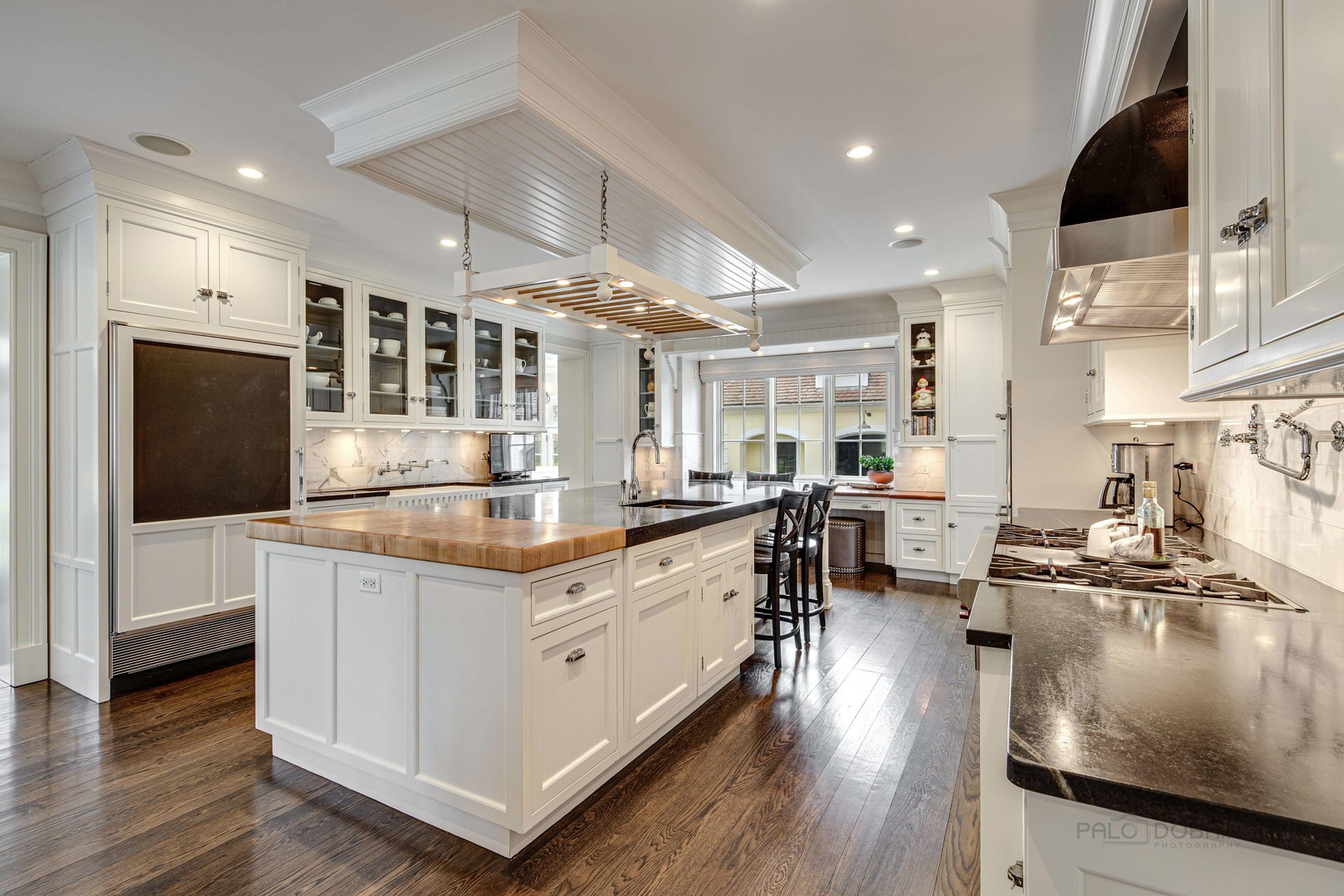 Undisclosed Address Lake Forest, IL 60045 - Photo 27 of 75 a kitchen with stainless steel appliances granite countertop a stove and a refrigerator