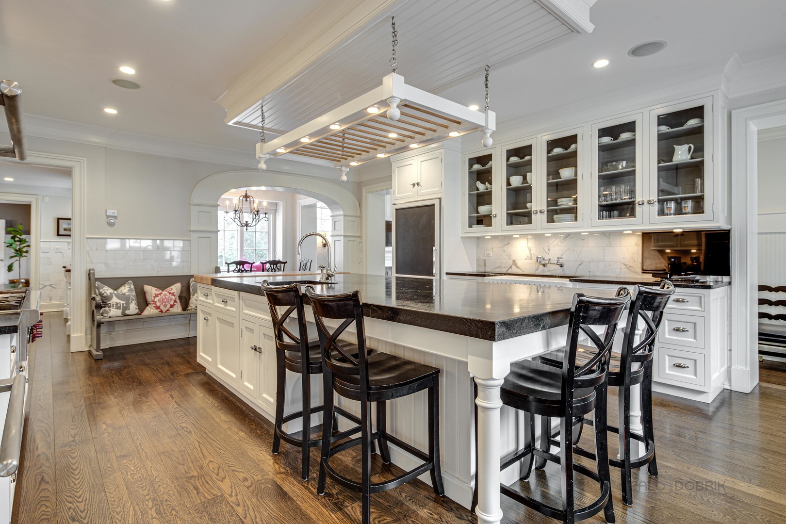 Undisclosed Address Lake Forest, IL 60045 - Photo 29 of 75 a view of a dining room with furniture and wooden floor