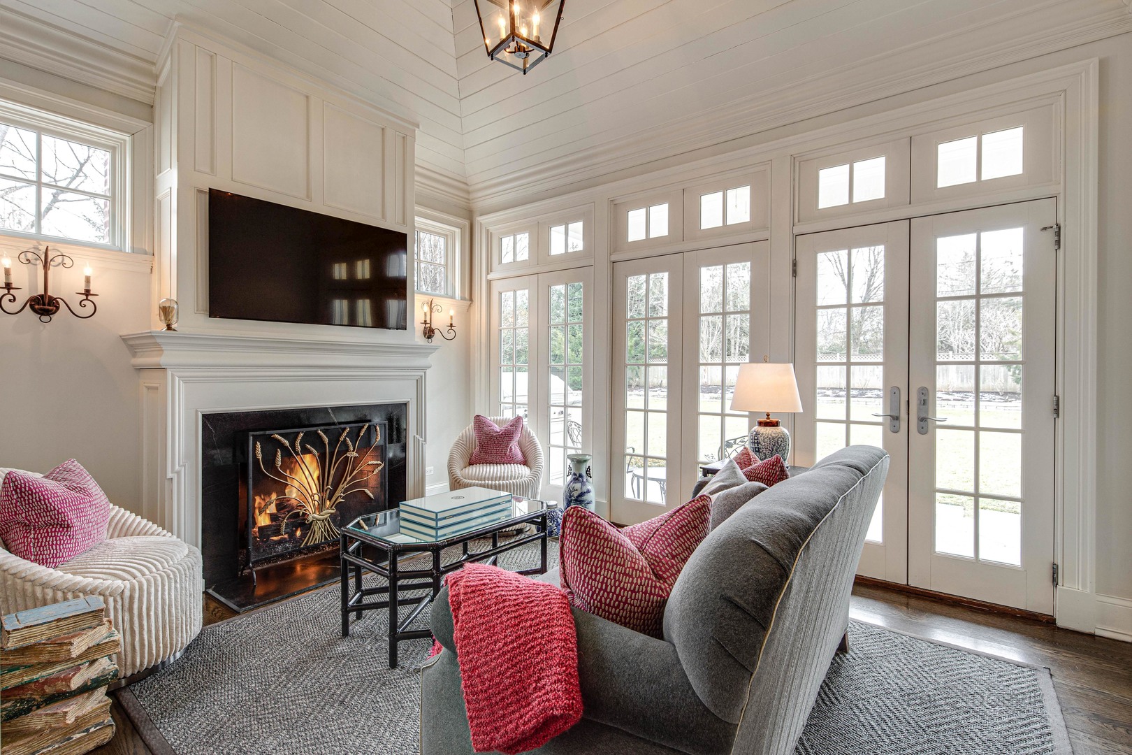 Undisclosed Address Lake Forest, IL 60045 - Photo 31 of 75 a living room with furniture a flat screen tv and a fireplace