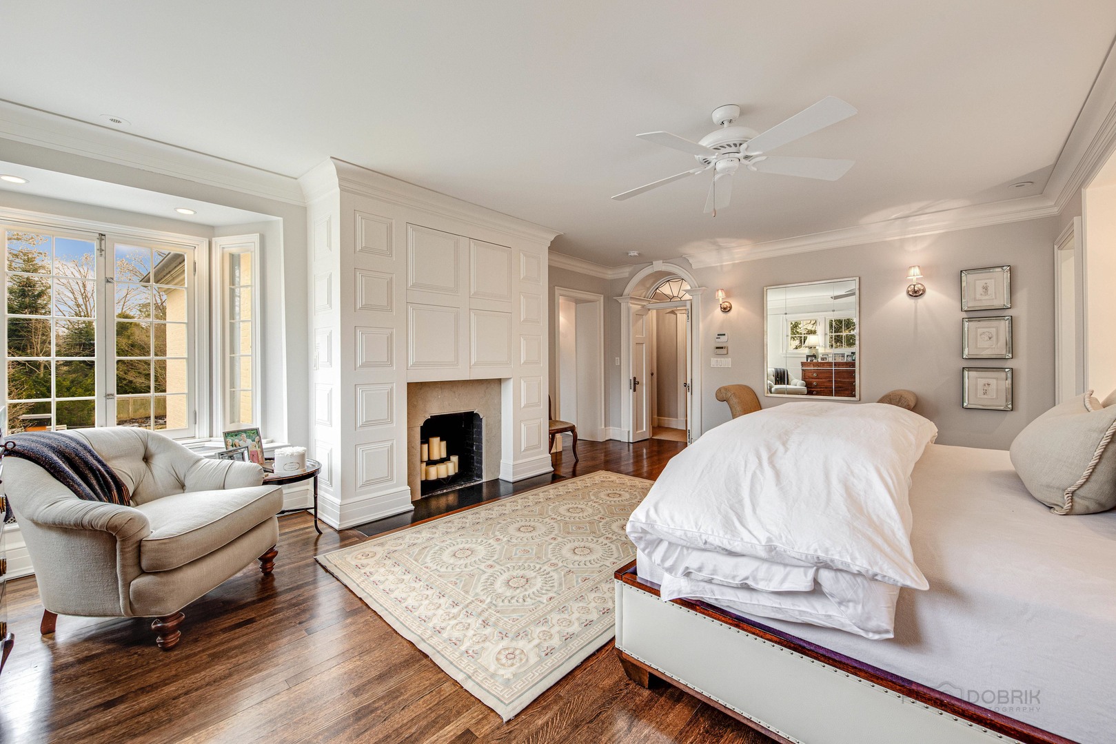 Undisclosed Address Lake Forest, IL 60045 - Photo 36 of 75 a spacious bedroom with a bed and a couch