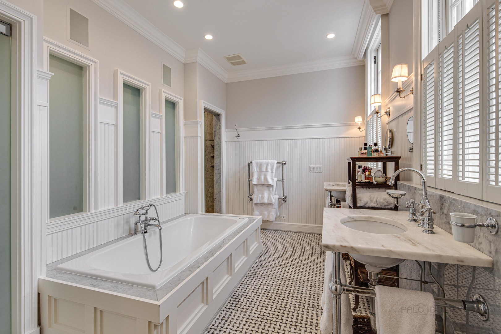 Undisclosed Address Lake Forest, IL 60045 - Photo 39 of 75 a bathroom with a sink and a mirror