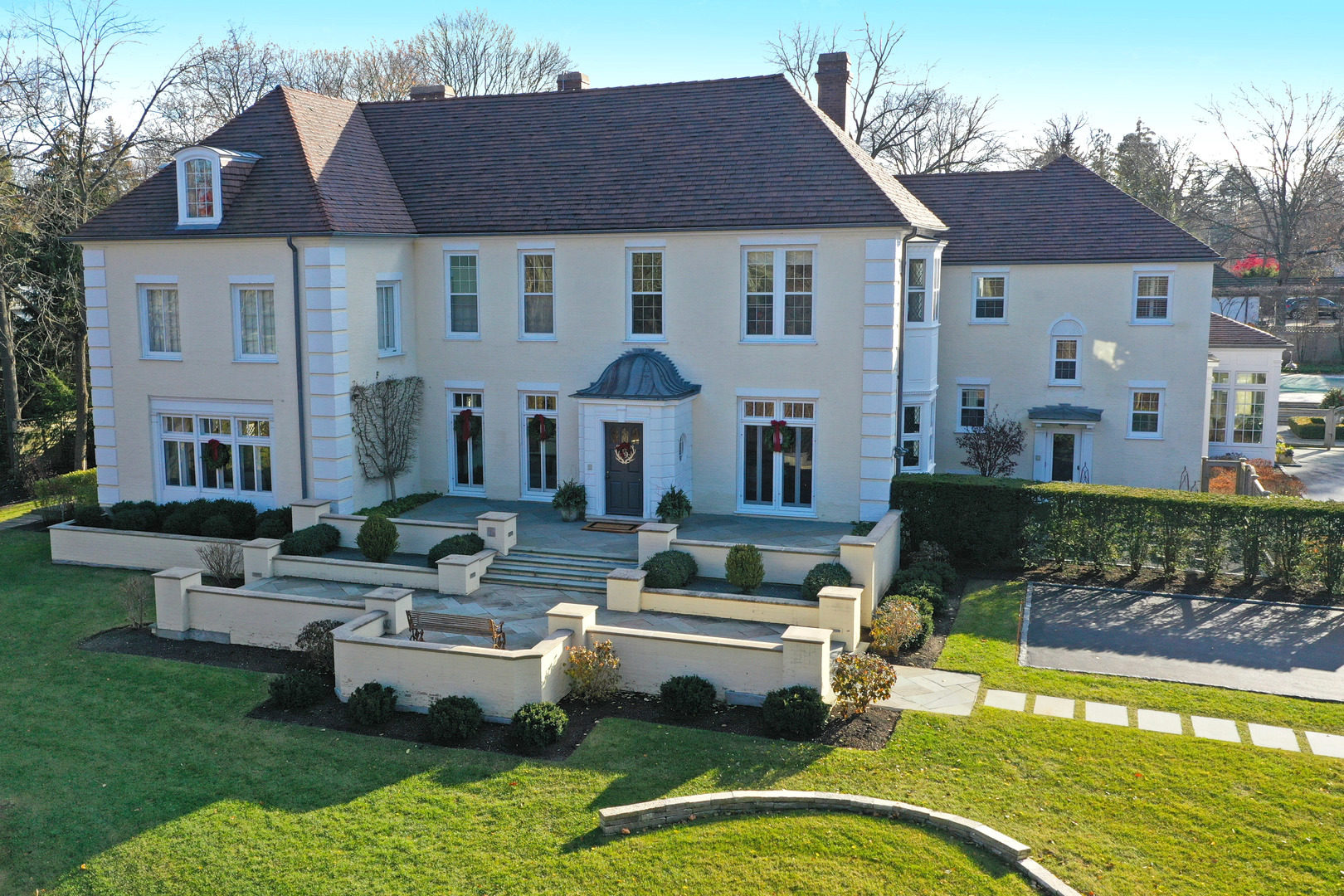 Undisclosed Address Lake Forest, IL 60045 - Photo 5 of 75 a front view of a house with swimming pool having outdoor seating
