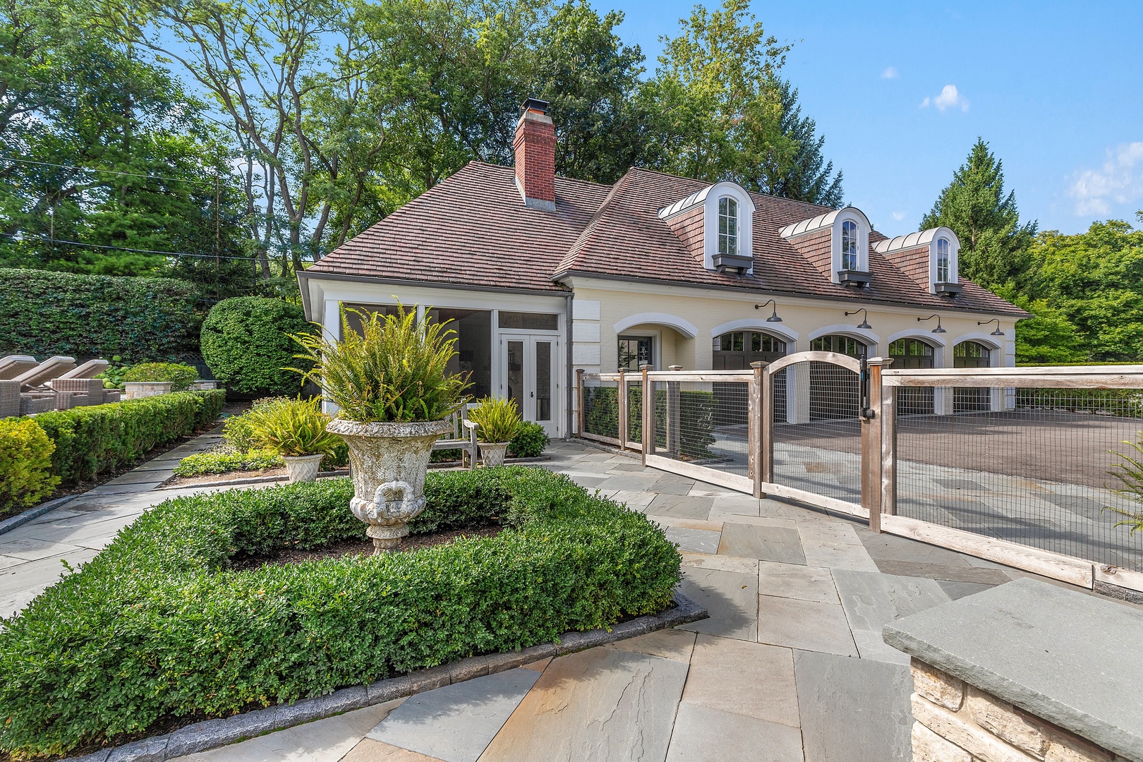 Undisclosed Address Lake Forest, IL 60045 - Photo 69 of 75 a front view of a house with a yard