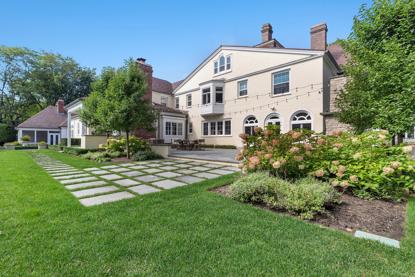 Undisclosed Address Lake Forest, IL 60045 - Photo 73 of 75 a front view of a house with a yard