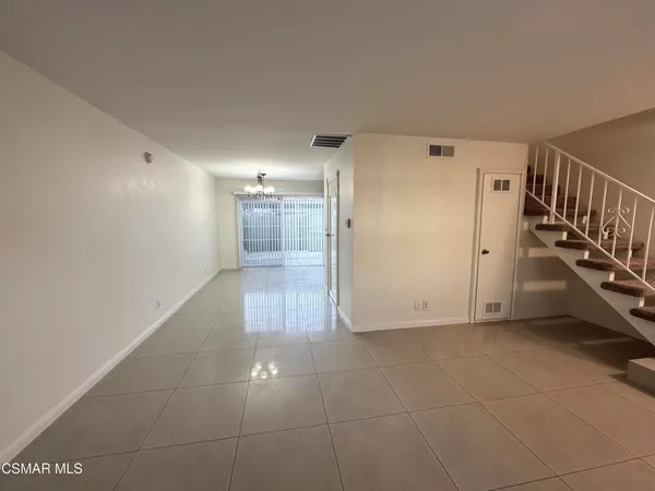 a view of a hallway with staircase
