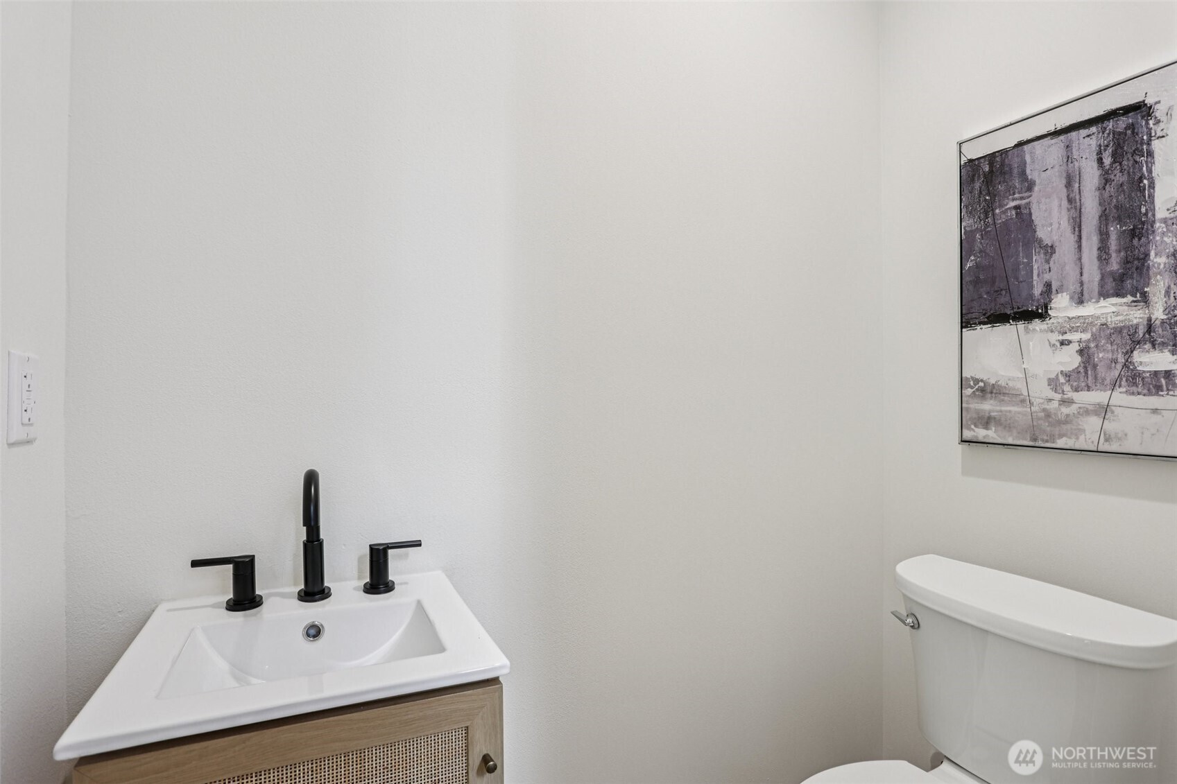 13748 Stone Avenue North Seattle, WA 98133 - Photo 18 of 22 a bathroom with a sink mirror and toilet